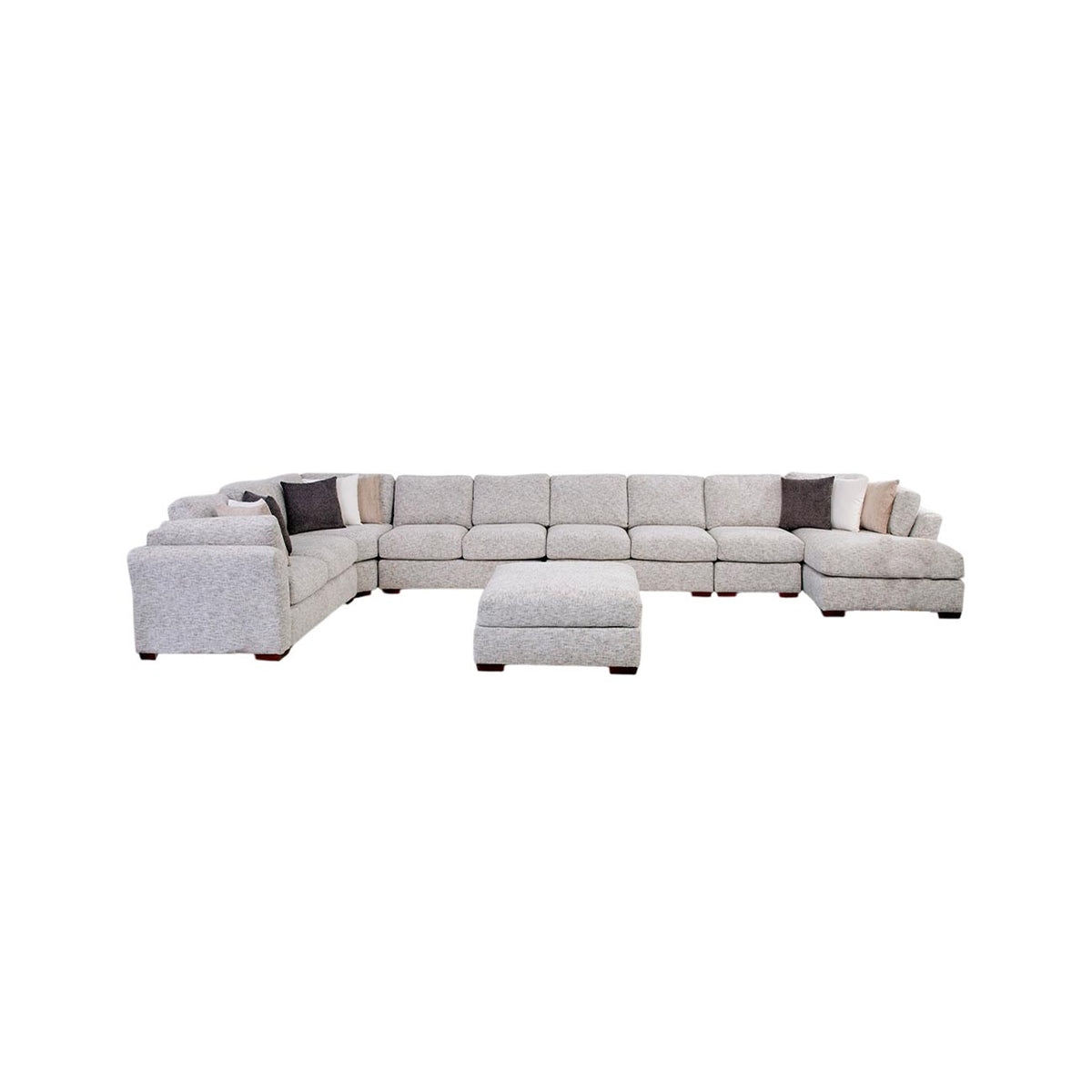 Sala modular Katina color beige con cojines decorativos y taburete